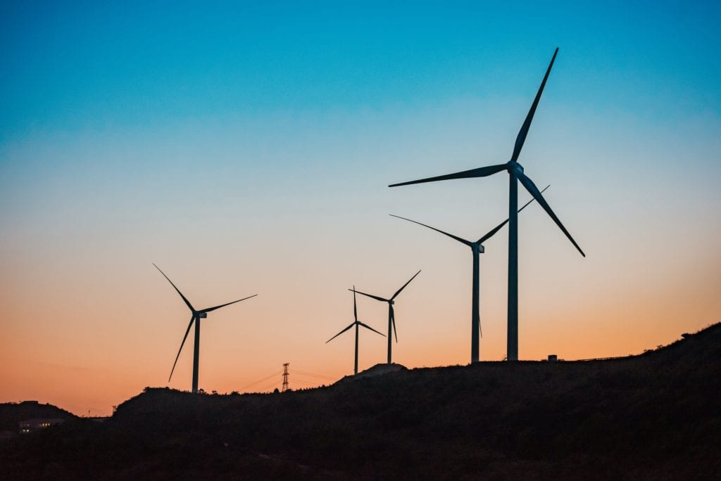 wind turbine towers in distance